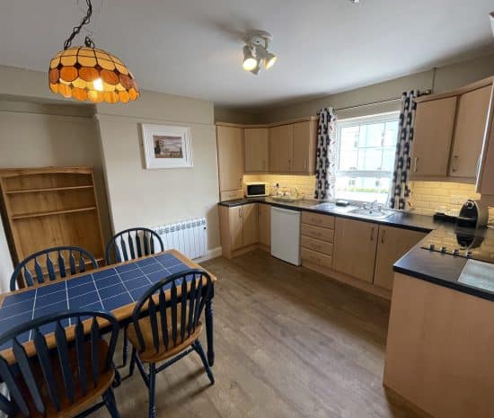 Standard Family Suite kitchen and table